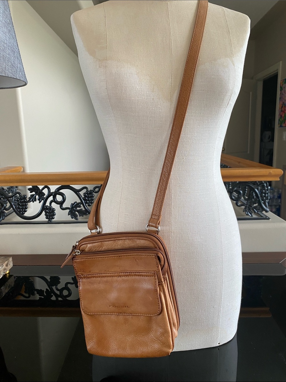 Fossil cognac brown leather messenger bag.